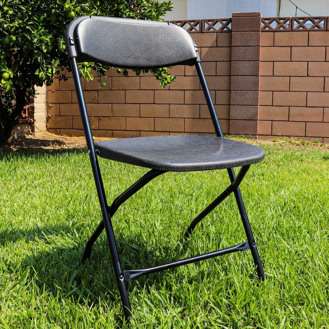 black plastic folding chair