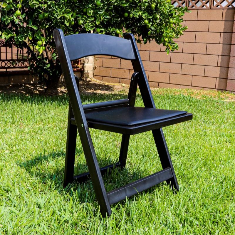 black resin padded folding chair